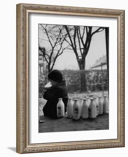 Small Boy Helping Himself to Milk-Gordon Parks-Framed Photographic Print