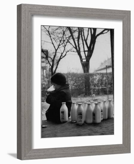 Small Boy Helping Himself to Milk-Gordon Parks-Framed Photographic Print
