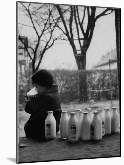 Small Boy Helping Himself to Milk-Gordon Parks-Mounted Photographic Print