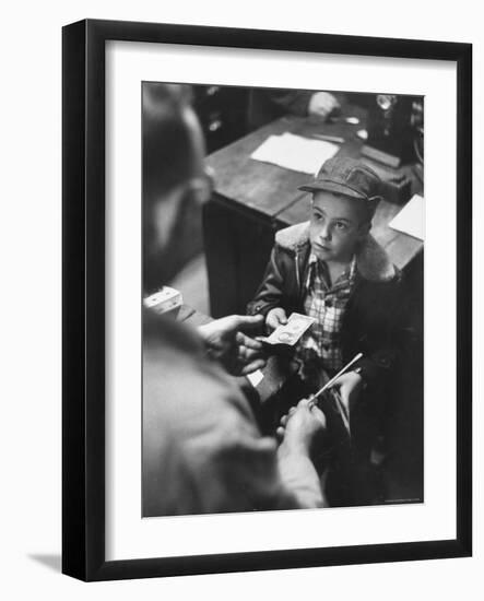 Small Boy Purchasing a Screwdriver at a Local Hardware Store-Robert W^ Kelley-Framed Photographic Print