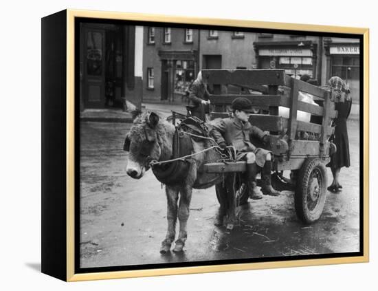 Small Boy Waits Patiently on a Donkey Cart in the Market Place at Kildare Co Kildare Ireland-null-Framed Premier Image Canvas