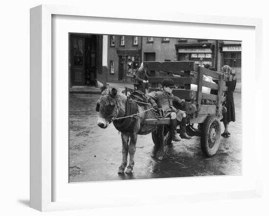 Small Boy Waits Patiently on a Donkey Cart in the Market Place at Kildare Co Kildare Ireland-null-Framed Premium Photographic Print