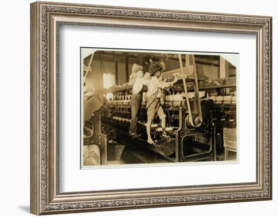 Small boys mend broken threads and replace empty bobbins at Bibb Mill, Macon, Georgia, 1909-Lewis Wickes Hine-Framed Photographic Print