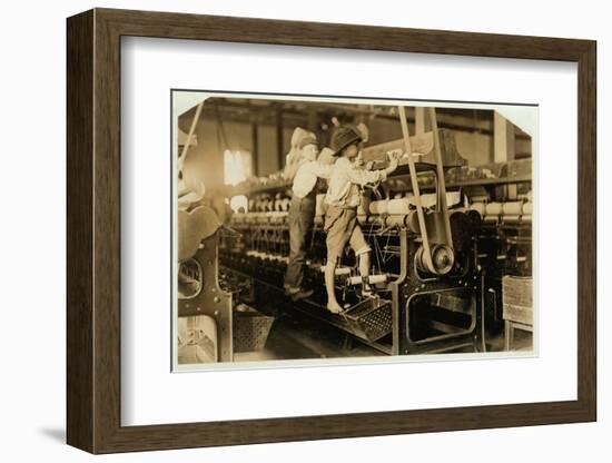 Small boys mend broken threads and replace empty bobbins at Bibb Mill, Macon, Georgia, 1909-Lewis Wickes Hine-Framed Photographic Print