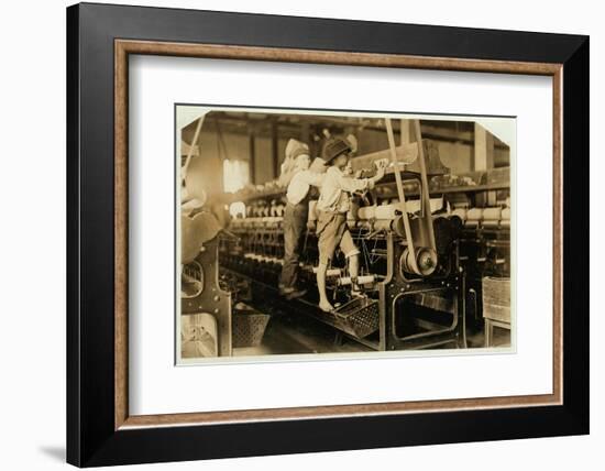 Small boys mend broken threads and replace empty bobbins at Bibb Mill, Macon, Georgia, 1909-Lewis Wickes Hine-Framed Photographic Print