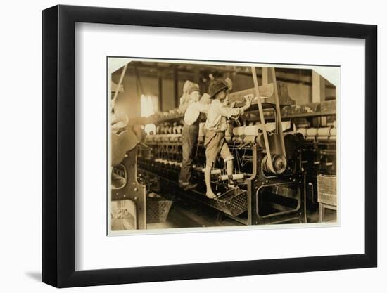 Small boys mend broken threads and replace empty bobbins at Bibb Mill, Macon, Georgia, 1909-Lewis Wickes Hine-Framed Photographic Print