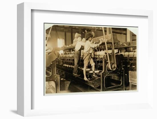 Small boys mend broken threads and replace empty bobbins at Bibb Mill, Macon, Georgia, 1909-Lewis Wickes Hine-Framed Photographic Print