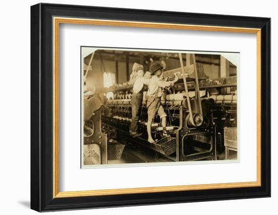 Small boys mend broken threads and replace empty bobbins at Bibb Mill, Macon, Georgia, 1909-Lewis Wickes Hine-Framed Photographic Print