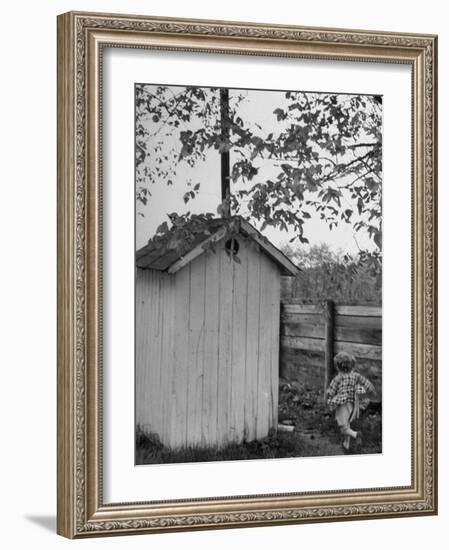 Small Child Running to the Outhouse at Rural School-Thomas D^ Mcavoy-Framed Photographic Print