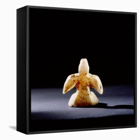 Small flat-bottomed ivory carving of a sea bird, probably a gaming piece-Werner Forman-Framed Premier Image Canvas