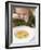 Small Girl Eating Soup with Teddy Bear Pasta-null-Framed Photographic Print