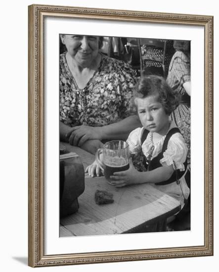 Small Girl Enjoying a Stein of Weak Beer-Dmitri Kessel-Framed Photographic Print