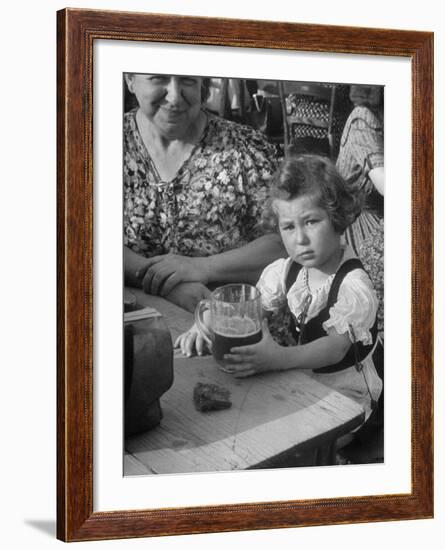 Small Girl Enjoying a Stein of Weak Beer-Dmitri Kessel-Framed Photographic Print