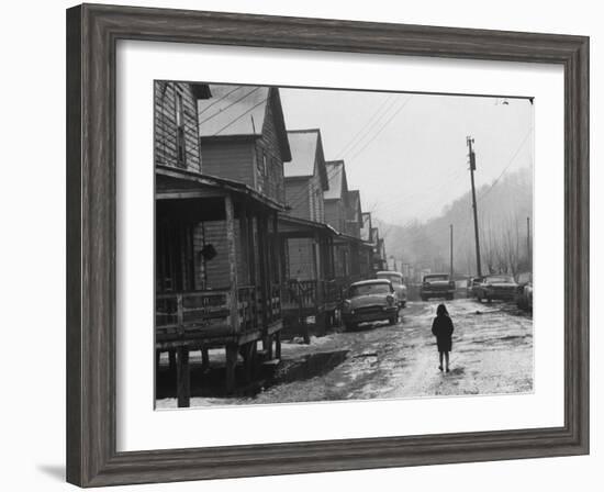 Small Girl Walking Down the Poverty Stricken Town of Hemphill in Appalachia-John Dominis-Framed Photographic Print