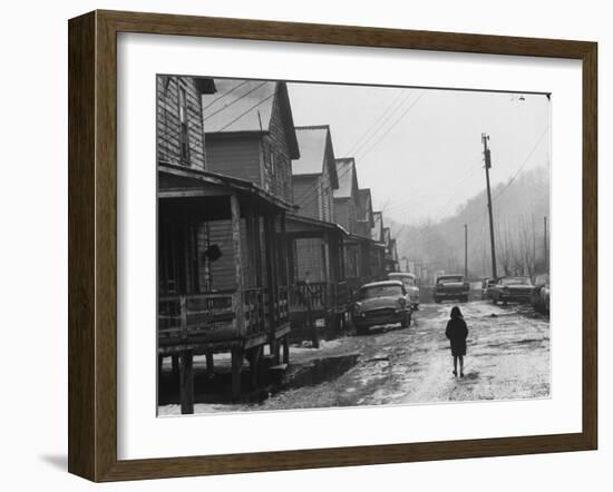 Small Girl Walking Down the Poverty Stricken Town of Hemphill in Appalachia-John Dominis-Framed Photographic Print