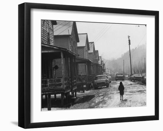 Small Girl Walking Down the Poverty Stricken Town of Hemphill in Appalachia-John Dominis-Framed Photographic Print