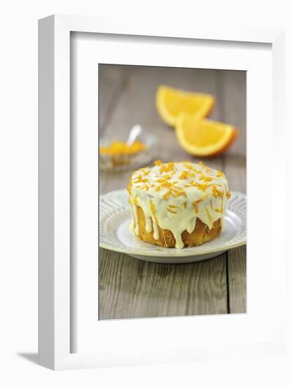 Small Orange Cake with White Icing on Plate-Jana Ihle-Framed Photographic Print