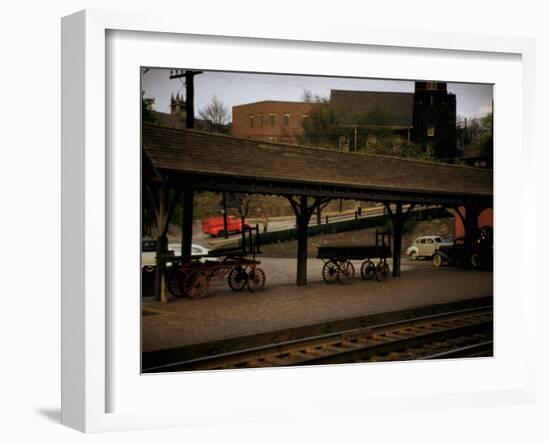 Small Railway Station with Wooden Buckboards for Baggage, Period Cars in Lot-Walker Evans-Framed Photographic Print