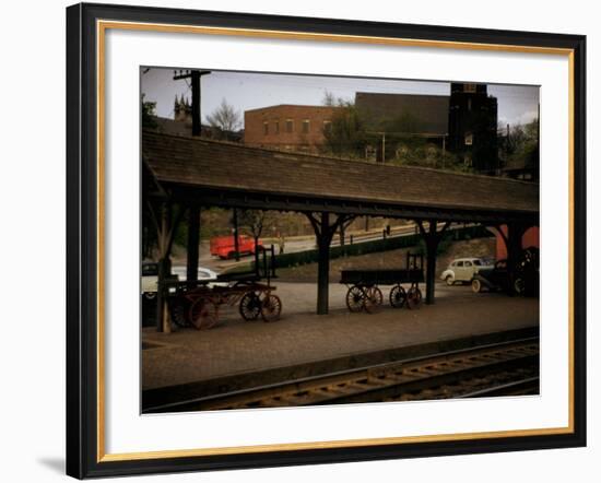 Small Railway Station with Wooden Buckboards for Baggage, Period Cars in Lot-Walker Evans-Framed Photographic Print