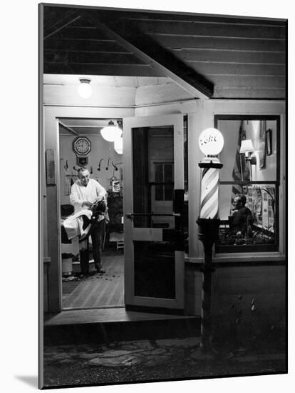 Small Town Barber Grover Cleveland Kohl Working in His Shop at Night-Alfred Eisenstaedt-Mounted Photographic Print