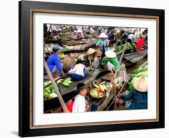 Small Wooden Boats Loaded with Fresh Produce Gather Along a Canal-null-Framed Photographic Print