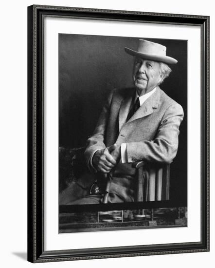 Smiling Architect Frank Lloyd Wright Seated While Wearing Hat-Alfred Eisenstaedt-Framed Premium Photographic Print