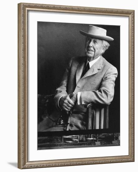 Smiling Architect Frank Lloyd Wright Seated While Wearing Hat-Alfred Eisenstaedt-Framed Premium Photographic Print