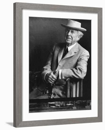 Smiling Architect Frank Lloyd Wright Seated While Wearing Hat-Alfred Eisenstaedt-Framed Premium Photographic Print