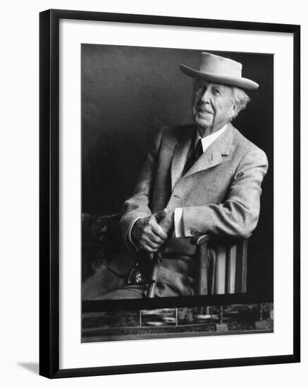 Smiling Architect Frank Lloyd Wright Seated While Wearing Hat-Alfred Eisenstaedt-Framed Premium Photographic Print