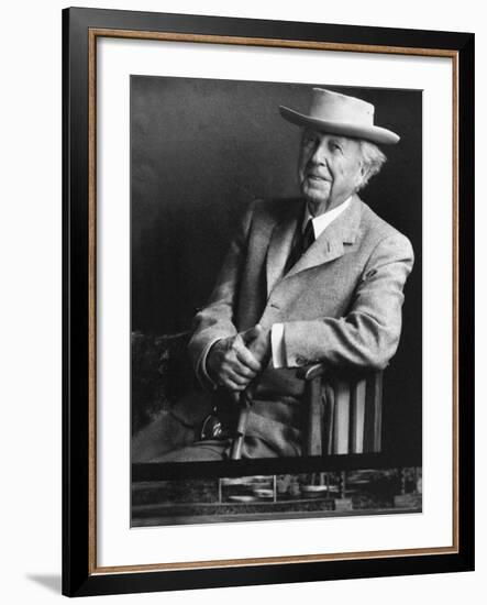 Smiling Architect Frank Lloyd Wright Seated While Wearing Hat-Alfred Eisenstaedt-Framed Premium Photographic Print