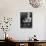 Smiling Architect Frank Lloyd Wright Seated While Wearing Hat-Alfred Eisenstaedt-Mounted Premium Photographic Print displayed on a wall