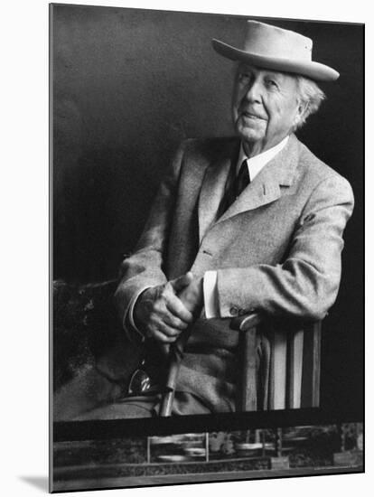 Smiling Architect Frank Lloyd Wright Seated While Wearing Hat-Alfred Eisenstaedt-Mounted Premium Photographic Print