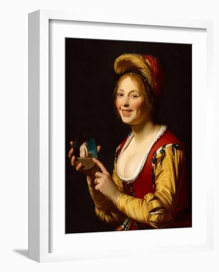 Smiling Girl, a Courtesan, Holding an Obscene Image, 1625-Gerrit van Honthorst-Framed Giclee Print