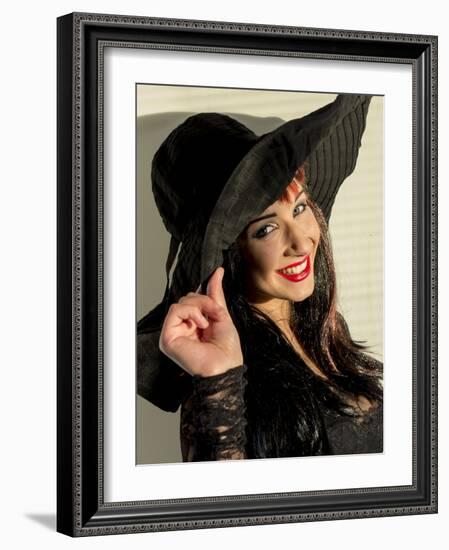 Smiling teenage girl in black hat-Charles Bowman-Framed Photographic Print