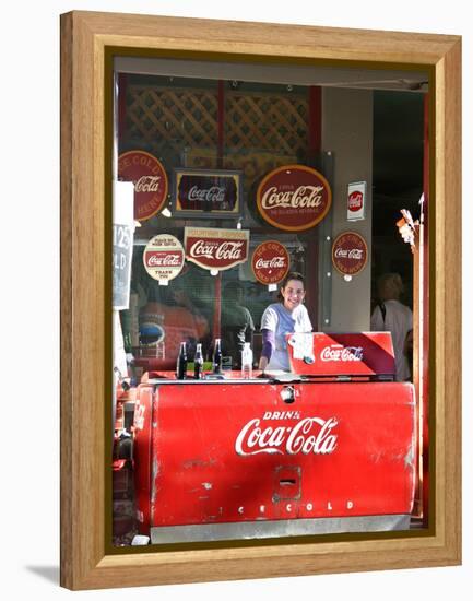 Smiling vendor in booth, Covered Bridge Festival, Mansfield, Indiana, USA-Anna Miller-Framed Premier Image Canvas