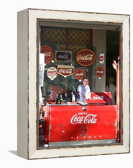 Smiling vendor in booth, Covered Bridge Festival, Mansfield, Indiana, USA-Anna Miller-Framed Premier Image Canvas