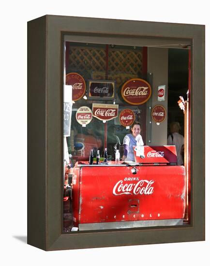 Smiling vendor in booth, Covered Bridge Festival, Mansfield, Indiana, USA-Anna Miller-Framed Premier Image Canvas