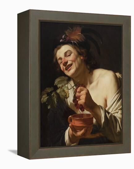 Smiling Young Man Squeezing Grapes, 1622 (Oil on Canvas)-Gerrit van Honthorst-Framed Premier Image Canvas