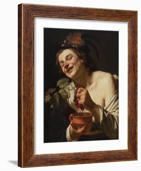 Smiling Young Man Squeezing Grapes, 1622 (Oil on Canvas)-Gerrit van Honthorst-Framed Giclee Print