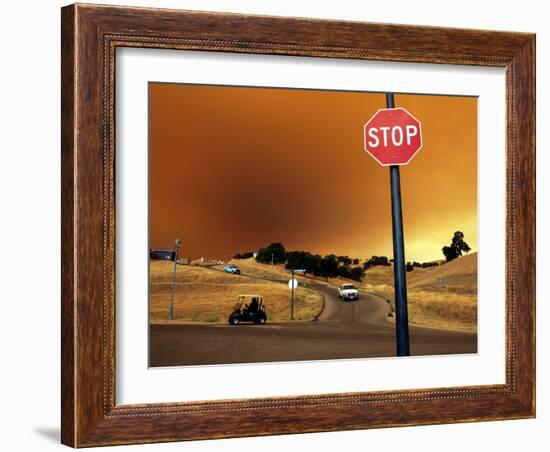 Smoke from a Wildfire Billows Over a Hillside-null-Framed Photographic Print