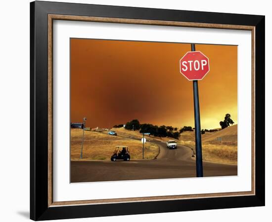 Smoke from a Wildfire Billows Over a Hillside-null-Framed Photographic Print