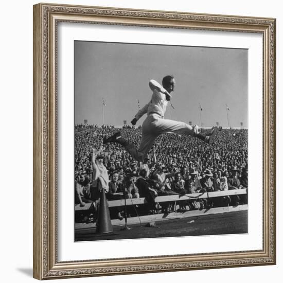 Smu Cheerleader Leaping High into Air at University of Texas Football Game-Loomis Dean-Framed Photographic Print