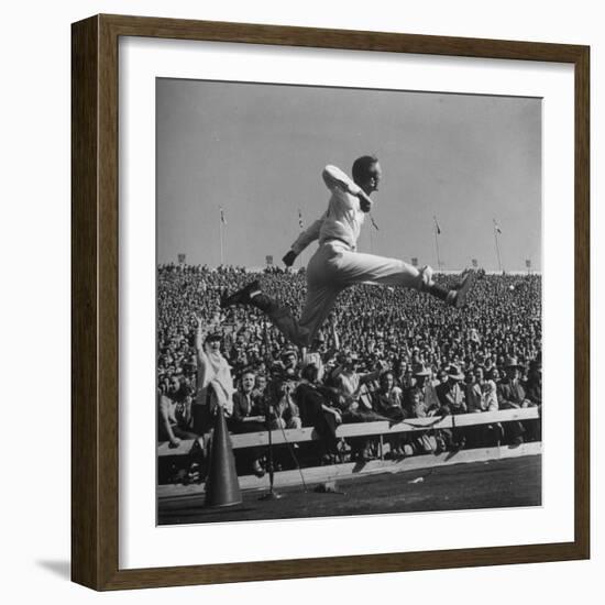 Smu Cheerleader Leaping High into Air at University of Texas Football Game-Loomis Dean-Framed Photographic Print