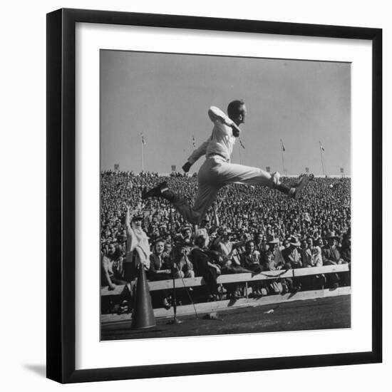 Smu Cheerleader Leaping High into Air at University of Texas Football Game-Loomis Dean-Framed Photographic Print