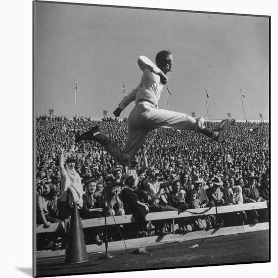 Smu Cheerleader Leaping High into Air at University of Texas Football Game-Loomis Dean-Mounted Photographic Print