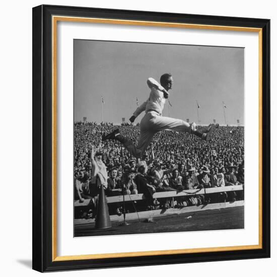 Smu Cheerleader Leaping High into Air at University of Texas Football Game-Loomis Dean-Framed Photographic Print