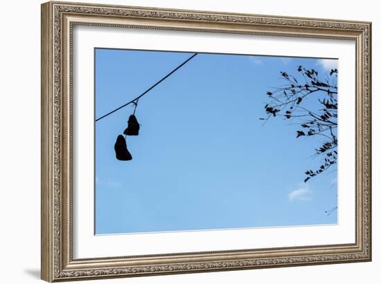 Sneakers on a Wire-null-Framed Photo