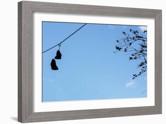 Sneakers on a Wire-null-Framed Photo