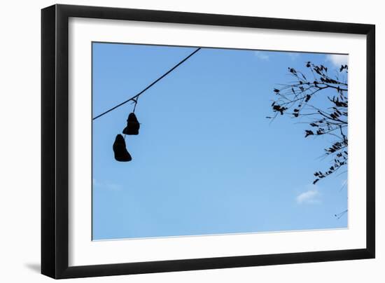 Sneakers on a Wire-null-Framed Photo