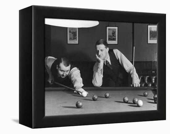 Snooker Player Prepares to Play a Shot as His Partner Looks On-null-Framed Premier Image Canvas